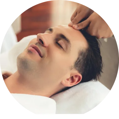 Man receiving Ayurvedic head massage therapy at Brahmi wellness center in Dubai
